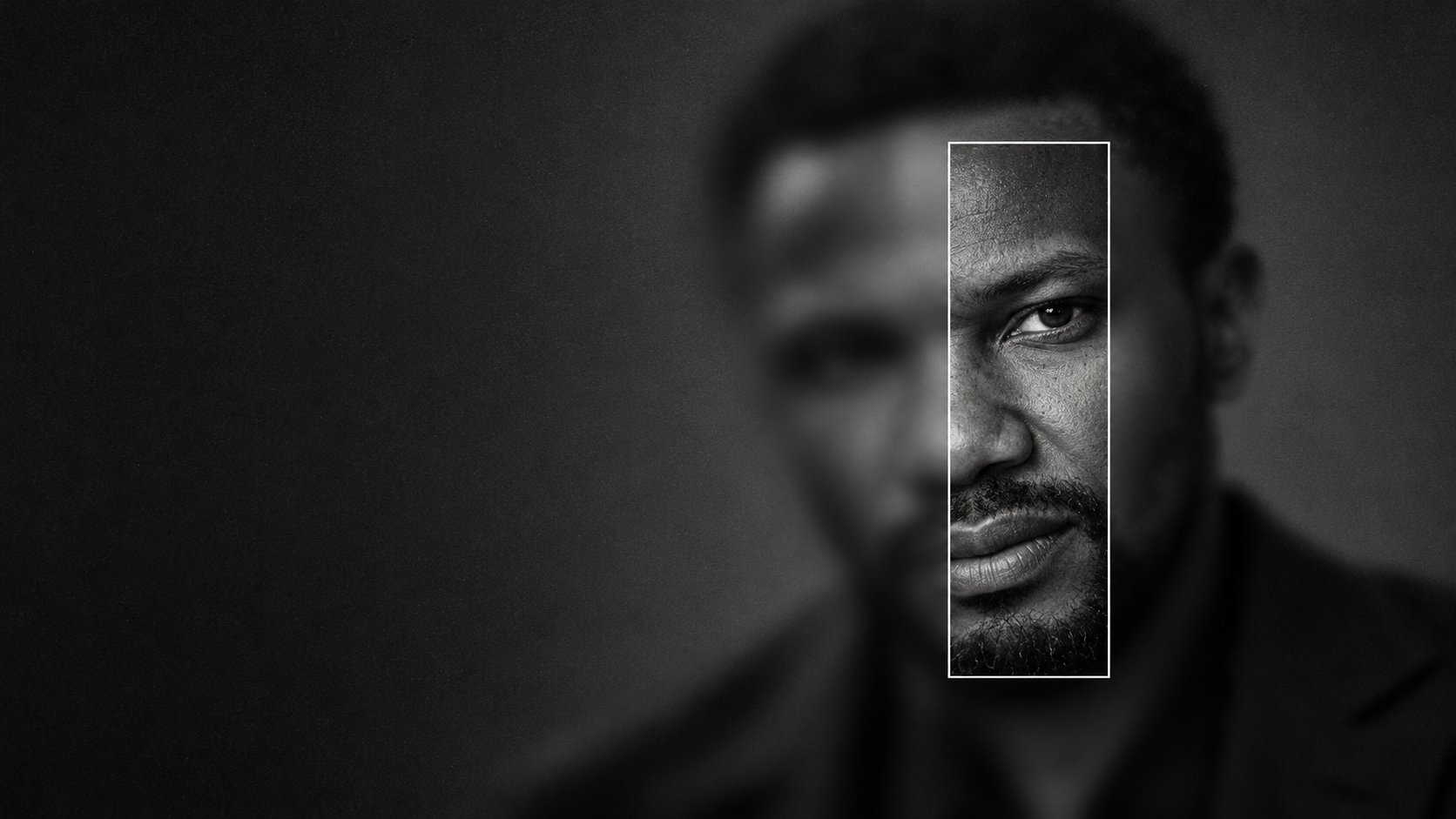 Monochrome portrait of Emanuel with a narrow focus frame over one eye